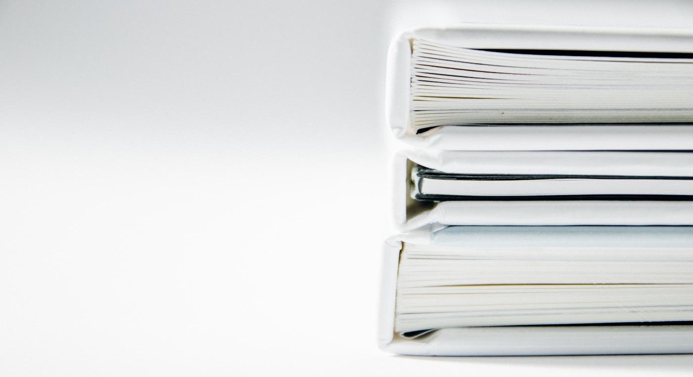 A stack of document folders